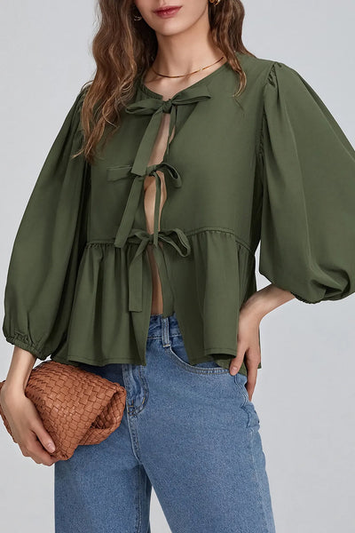 Sofia™ | Blusa con maniche a sbuffo, peplum e fiocchetti