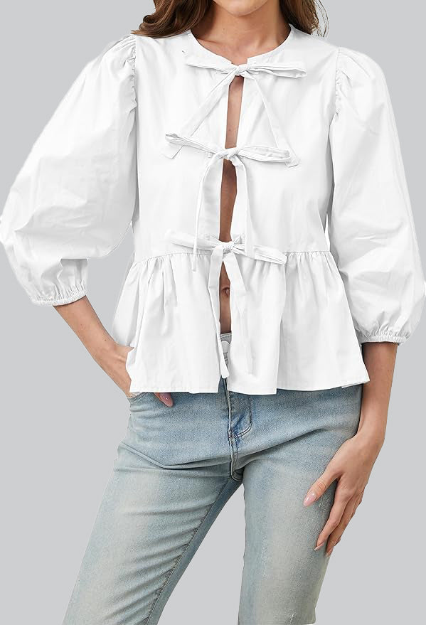 Sofia™ | Blusa con maniche a sbuffo, peplum e fiocchetti