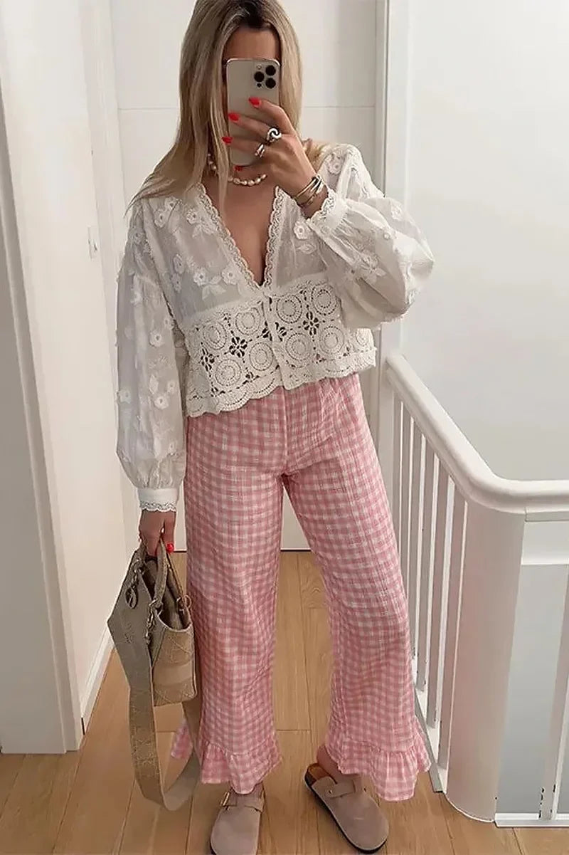 Sofia™ | Blusa con colletto Peter Pan e fiocchi