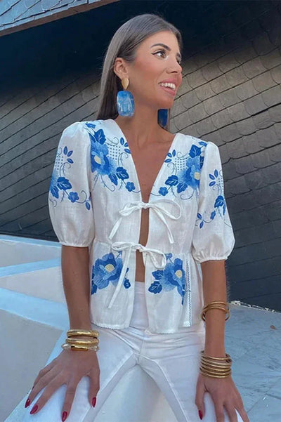 Sofia™ | Blusa Peplum con Motivo Floreale e Fiocco