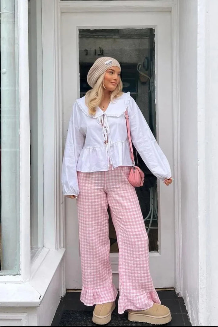 Sofia™ | Blusa con colletto Peter Pan e fiocchi